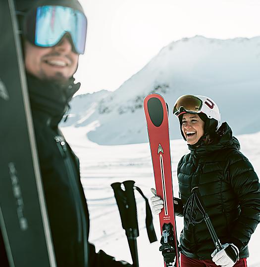 Two skiers completing their high altitude training in the Alps